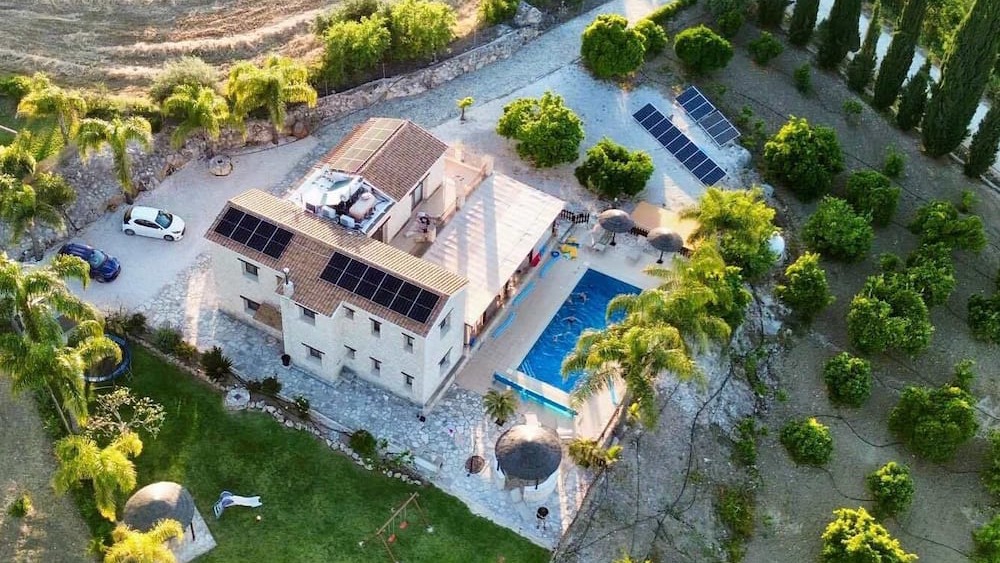 Aerial view of Stephanie Villa, its pool and grounds in the Simou countryside